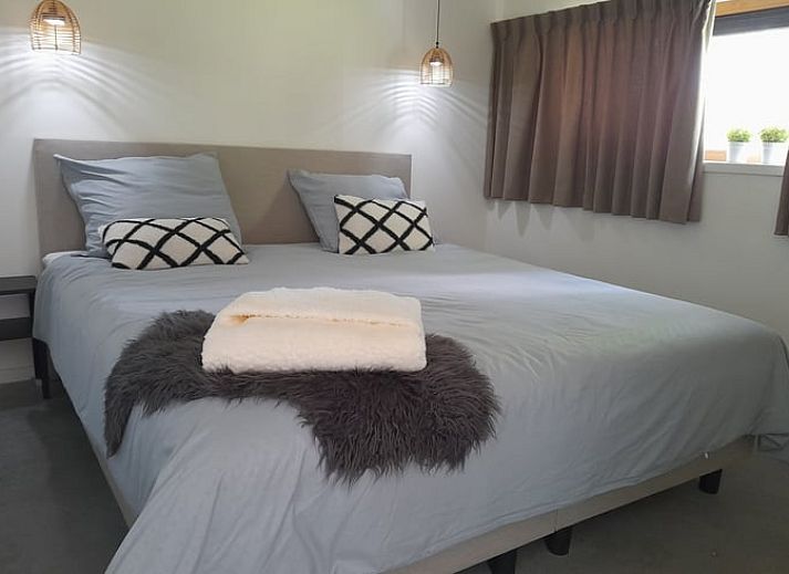 Vakantiehuis in IJhorst met zonnig terras en groene omgeving in Noordwest Overijssel, ideaal voor een ontspannen verblijf.