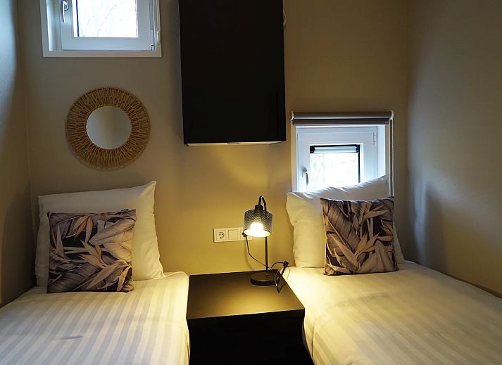 Detached house in IJhorst, Northwest Overijssel, offers a modern vacation home with a beautiful terrace surrounded by nature.