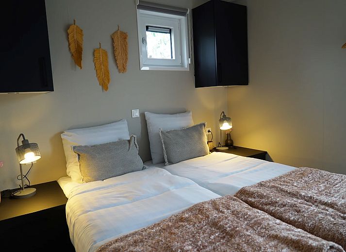 Detached house in IJhorst, Northwest Overijssel, offers a modern vacation home with a beautiful terrace surrounded by nature.