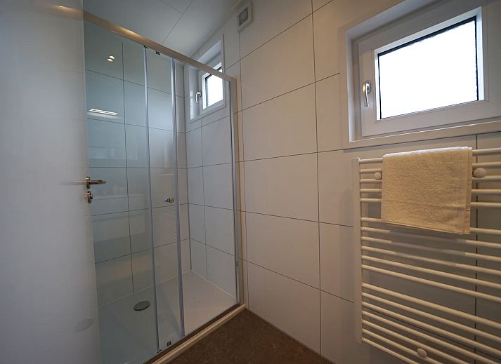 Cozy bedroom in detached house in IJhorst, Overijssel, with comfortable beds and mood lighting.