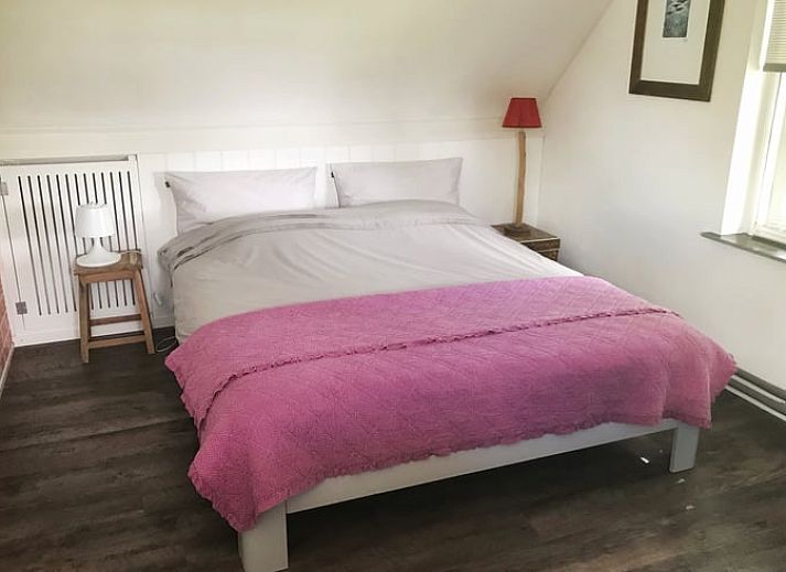 Terras met uitzicht op water bij Vakantiehuis in Kalenberg, Noordwest Overijssel, Overijssel.