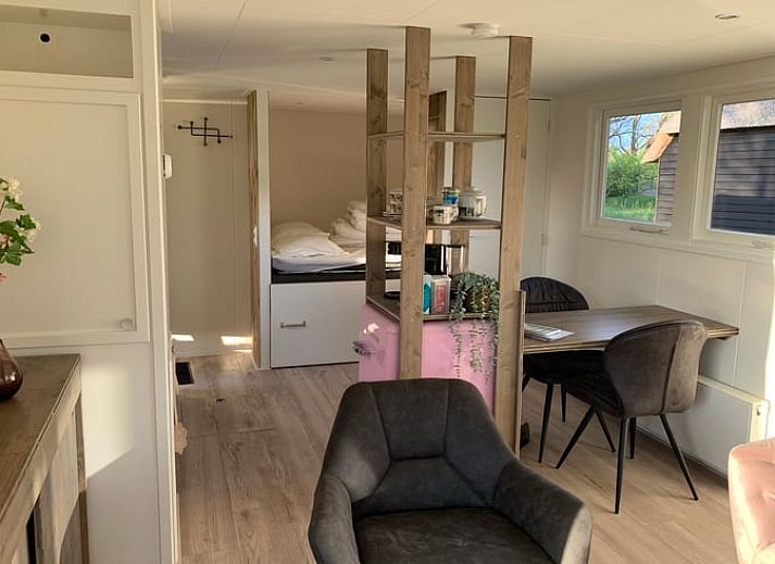 Cozy terrace at Holiday home in Kalenberg, surrounded by greenery in Overijssel.