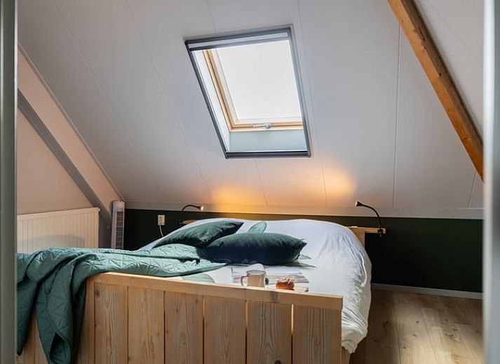 Gezellige zithoek in Vakantiehuisje in Wetering, Noordwest Overijssel. Comfortabele stoelen met uitzicht op de tuin.