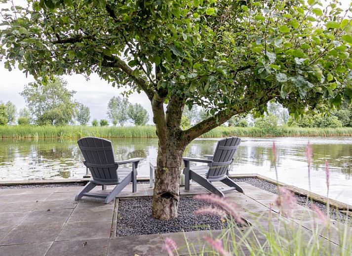 Stijlvolle binnenruimte van Vakantiehuisje in Wetering, Overijssel. Moderne inrichting met veel natuurlijk licht.