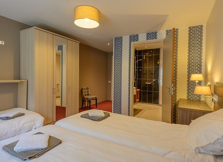 Gemuetlicher Innenbereich des Ferienhauses OV151 in Blokzijl mit bequemen Sitzgelegenheiten und moderner Einrichtung.