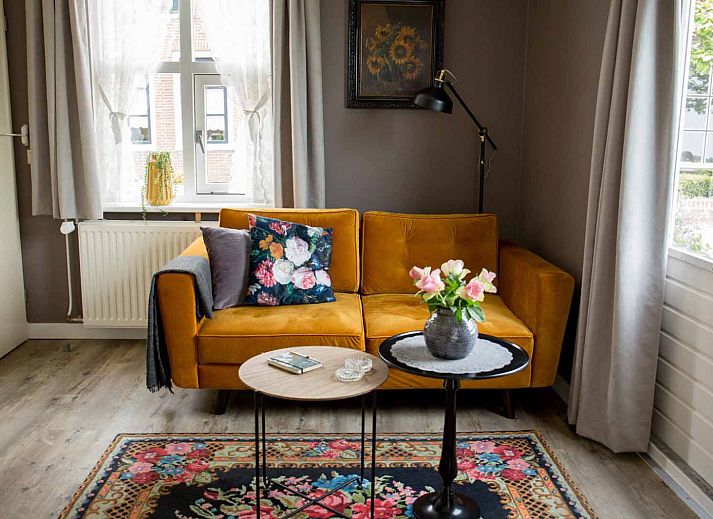 Attractive bedroom in OV684 vacation home, Blokzijl, with colorful flower wallpaper, Northwest Overijssel.