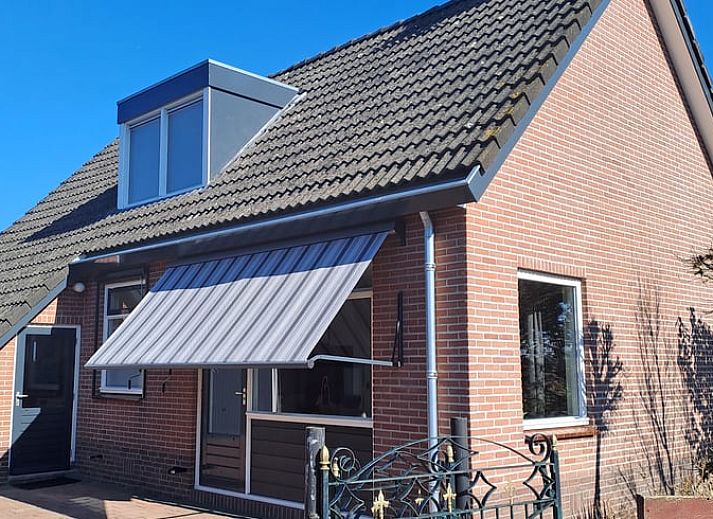 Vacation home in Blokzijl with green garden and glass veranda in Northwest Overijssel, Overijssel.