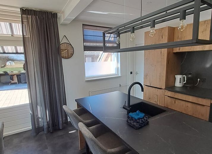 Spacious courtyard of Holiday home in Blokzijl with wooden barn in Northwest Overijssel, Overijssel.