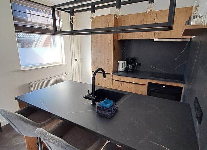 Spacious courtyard of Holiday home in Blokzijl with wooden barn in Northwest Overijssel, Overijssel.