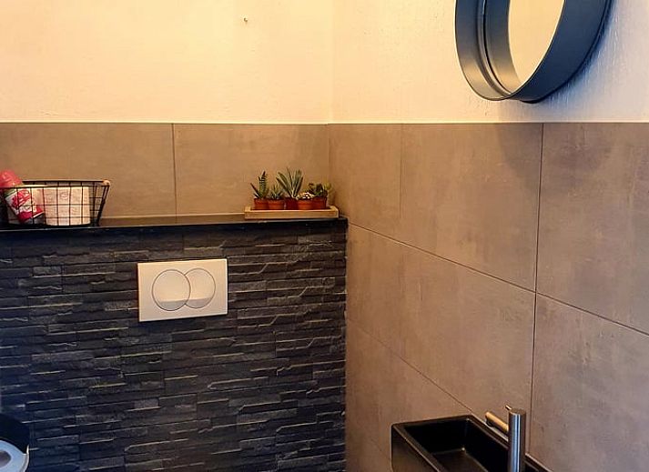 Vacation home in Blokzijl surrounded by flowers and greenery in Northwest Overijssel, Overijssel.