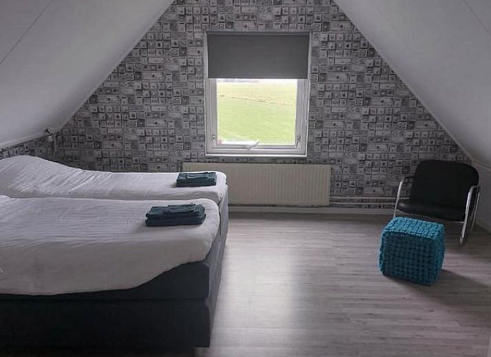 Terrace and garden of Holiday home in Blokzijl overlooking fields in Northwest Overijssel, Overijssel.