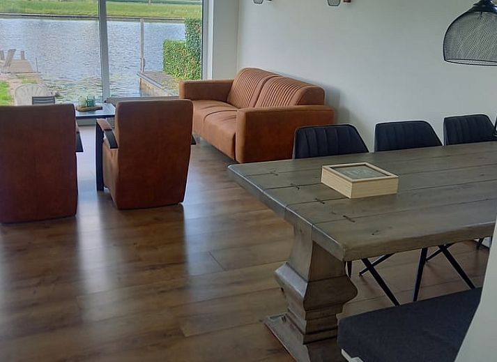 Enjoy the terrace at Holiday Home in IJsselmuiden, located on the water in Northwest Overijssel.