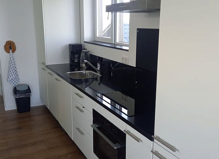 Relax at sunset on the dock of Holiday Home in IJsselmuiden, Overijssel.