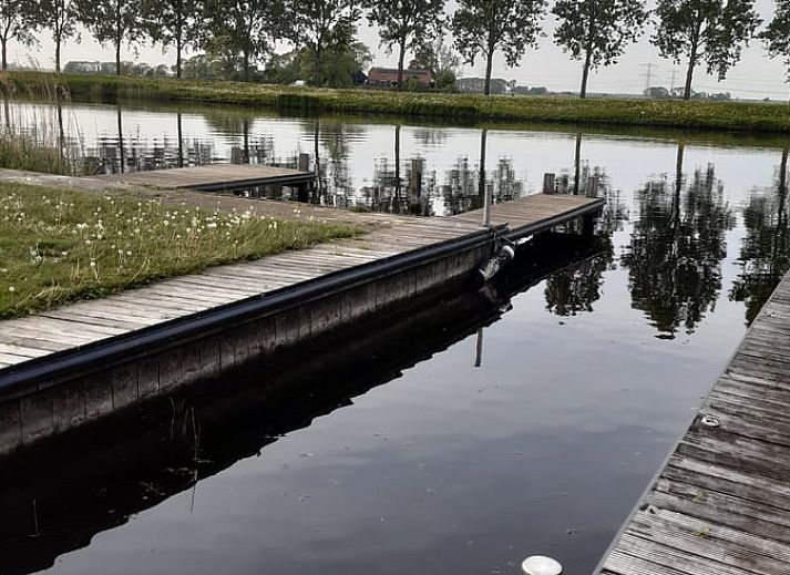 Modern living room in Holiday home in IJsselmuiden overlooking the water, Northwest Overijssel.