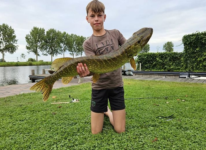Modern living room in Holiday home in IJsselmuiden overlooking the water, Northwest Overijssel.