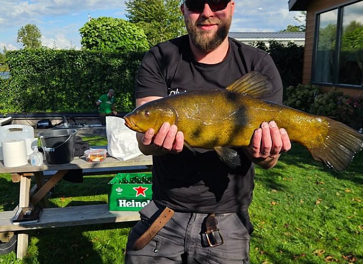 Exterior of Holiday home in IJsselmuiden, a charming vacation home in Overijssel.