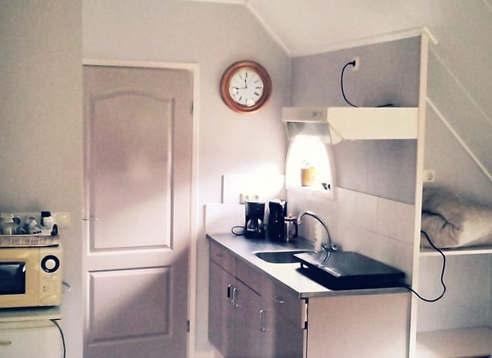 Snow covers the Cottage in Eesveen, idyllic winter setting in northwestern Overijssel, Overijssel.