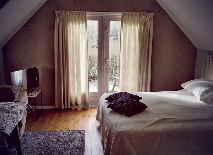 Cozy interior of House in Eesveen with candlelight, atmospheric vacation home in Overijssel.