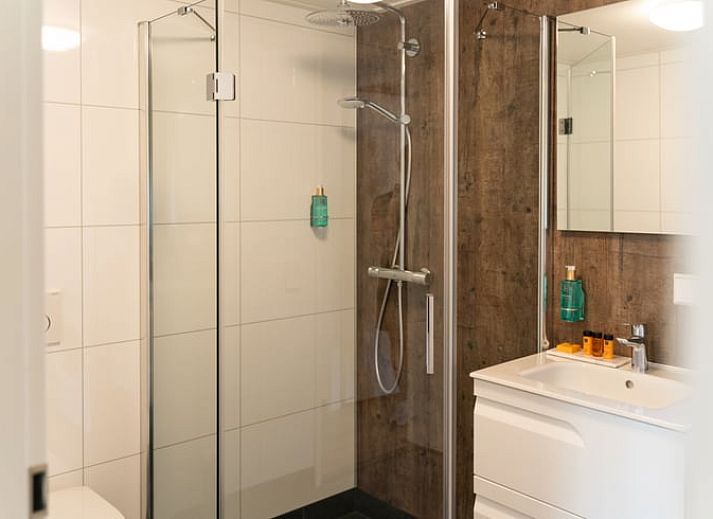 Bequeme Sitzgelegenheiten im Ferienhaus in Baars, perfekt fuer Entspannung in Overijssel.