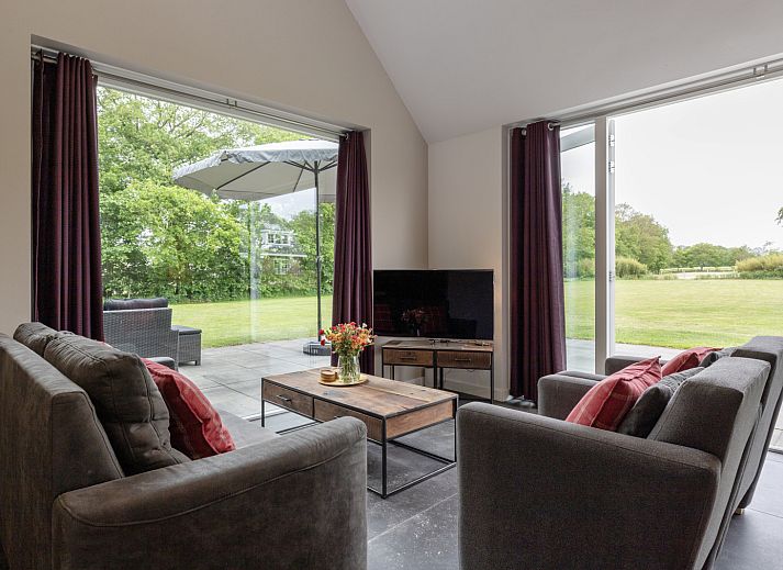 Vacation home OV473 in Baars, Northwest Overijssel, offers a serene setting with a spacious terrace and beautiful views of the surrounding nature.