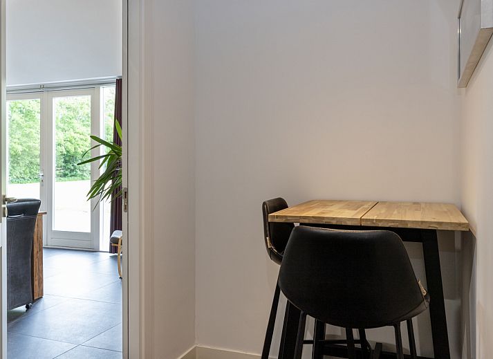 Enjoy the rustic nature surrounding vacation home OV473 in Baars, Overijssel, with vast fields of flowers and green forests.