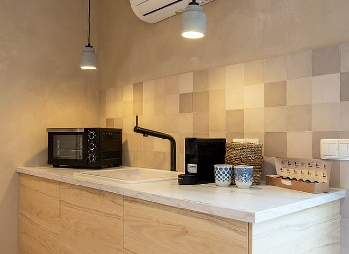 Ferienhaus in Staphorst, ein charmantes Ferienhaus im Nordwesten von Overijssel mit einer einladenden Terrasse und gruener Umgebung.