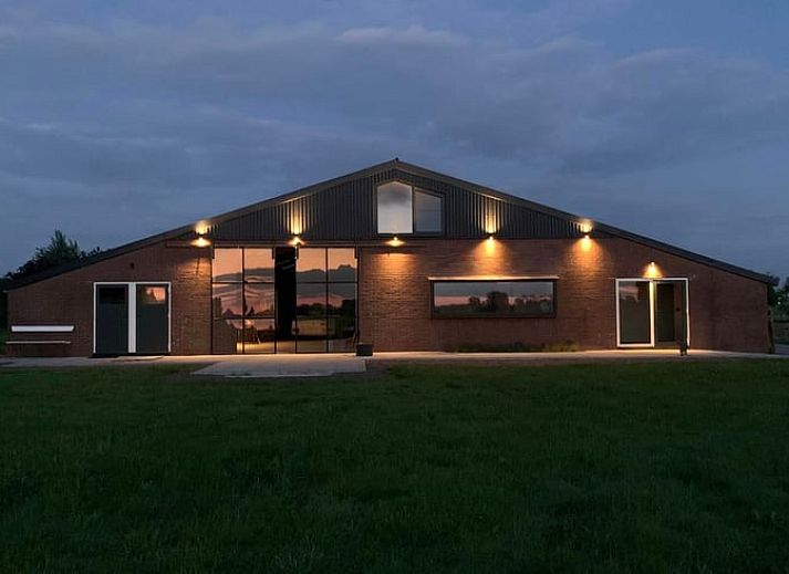 Cozy dining area in Holiday Home in Zalk overlooking the countryside of Northwest Overijssel.