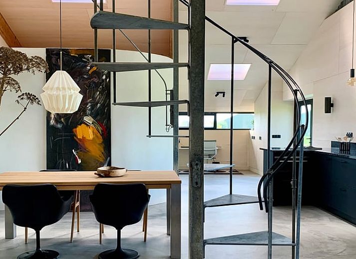 Cozy dining area in Holiday Home in Zalk overlooking the countryside of Northwest Overijssel.