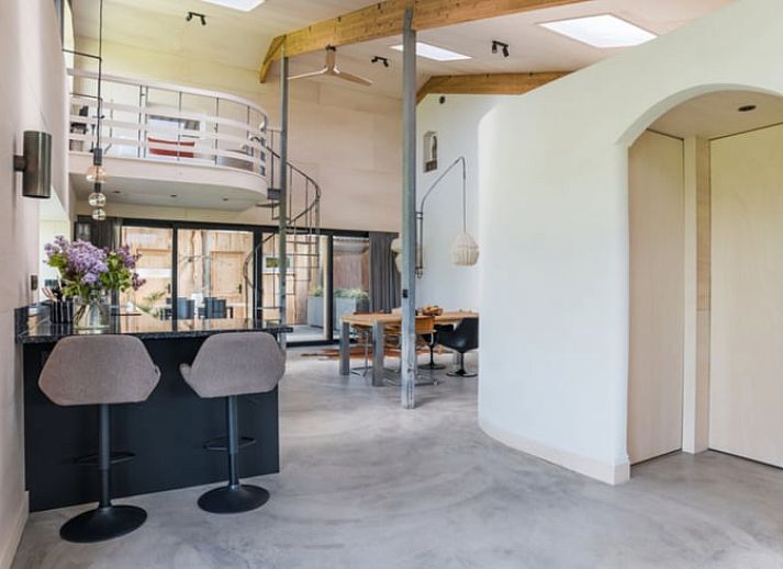Cozy dining area in Holiday Home in Zalk overlooking the countryside of Northwest Overijssel.