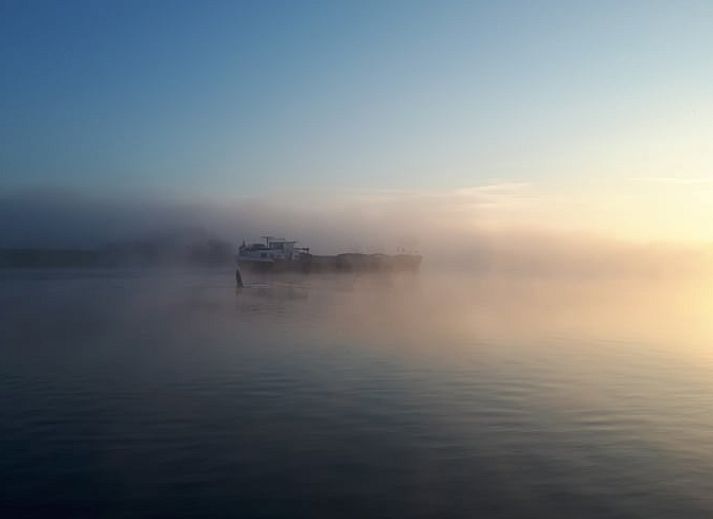 Modern interior space with spiral staircase in Holiday home in Zalk, perfect for a relaxing stay in Overijssel.