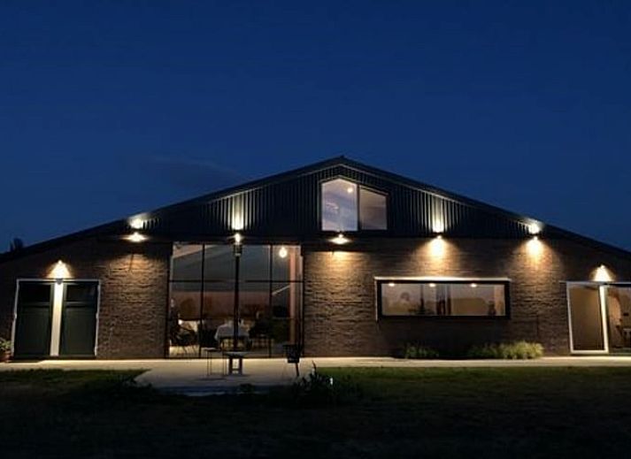 Open kitchen and dining area in Holiday Home in Zalk, Northwest Overijssel, ideal for socializing.