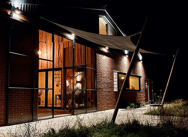 Open kitchen and dining area in Holiday Home in Zalk, Northwest Overijssel, ideal for socializing.