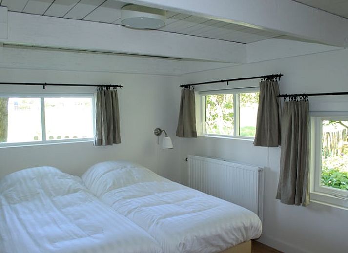 Ferienhaus in Abcoude mit schoener Holzfassade, ideal gelegen in der Natur von Utrecht Nord.