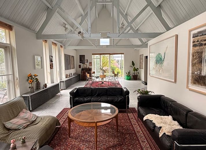 Schlafzimmer mit Sitzecke im Ferienhaus in Abcoude, Utrecht Nord.