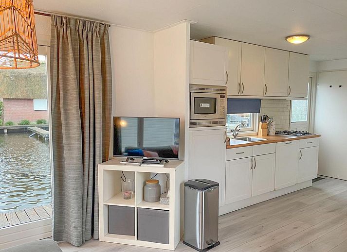 Zonovergoten veranda van Blauwborst 24-18 vakantiehuis in Breukelen, Utrecht