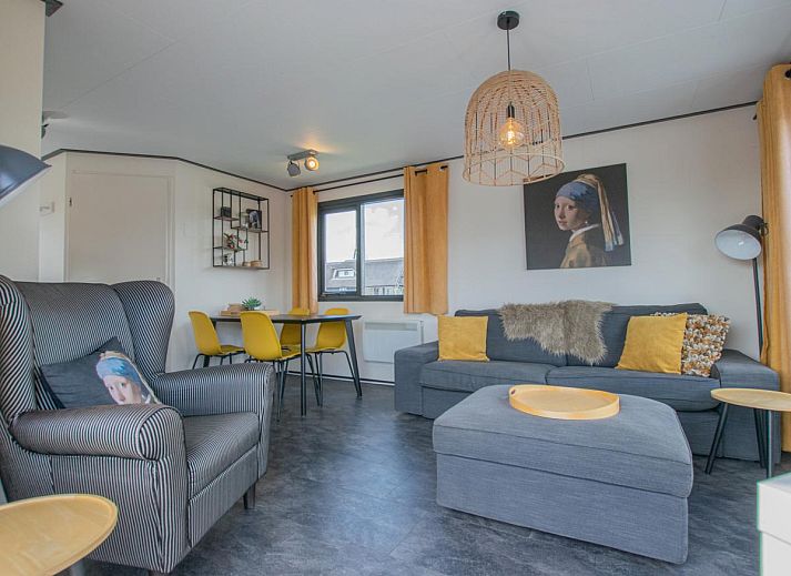 Blauwborst 24-20 vakantiehuis in Breukelen met terras aan het water en aangemeerde boten.