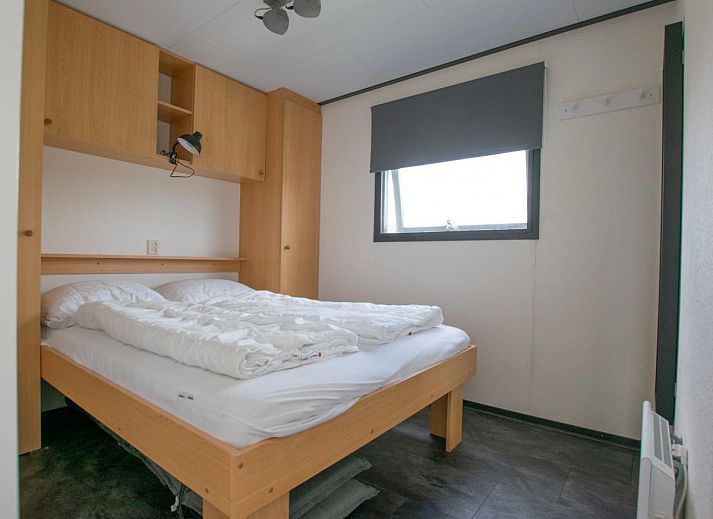 Exterieur van Blauwborst 24-20 vakantiehuis in Breukelen, Utrecht met groene omgeving.