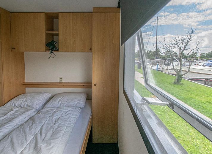 Exterieur van Blauwborst 24-20 vakantiehuis in Breukelen, Utrecht met groene omgeving.