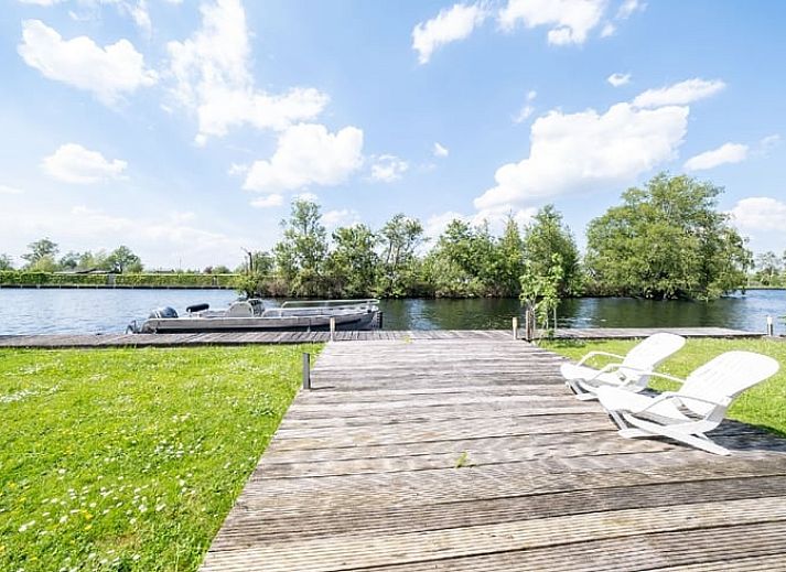 Huisje in Vinkeveen, vakantiehuis met groene tuin en terras in Utrecht noord.