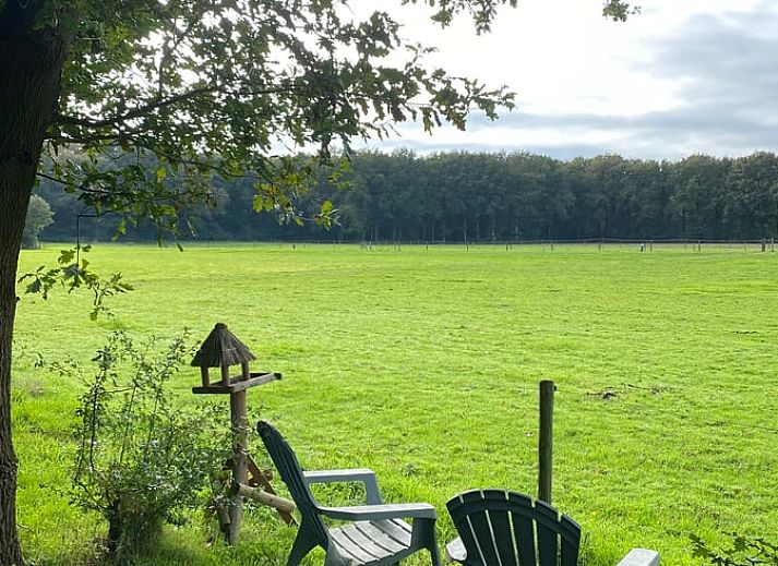 Geraeumiges Esszimmer in Cottage in Soest, Ferienhaus in Soest, Utrecht mit Holzinterieur.