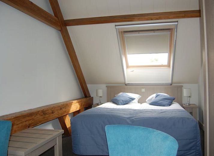 Gezellige binnenruimte van Vakantiehuisje in Vreeland, Utrecht met open keuken en eetgedeelte.