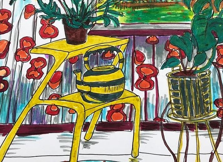 Binnenruimte van Vakantiehuisje in Tienhoven met boekenkast en uitzicht op de vijver in Utrecht noord.