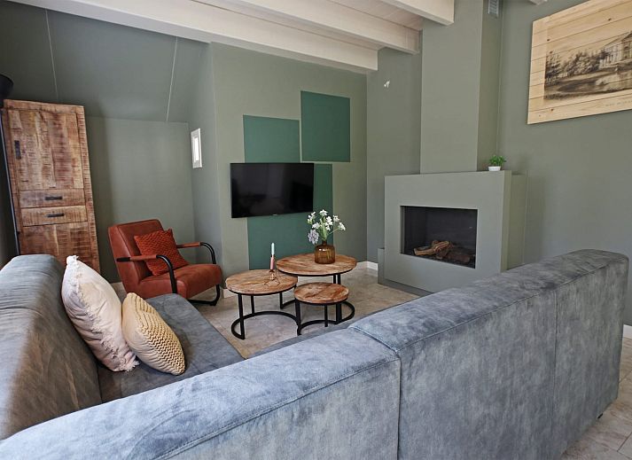 Vakantiewoning Molenbosch in Doorn, Utrechtse Heuvelrug biedt een idyllisch vakantiehuis omgeven door weelderige natuur en rustgevende bossen.