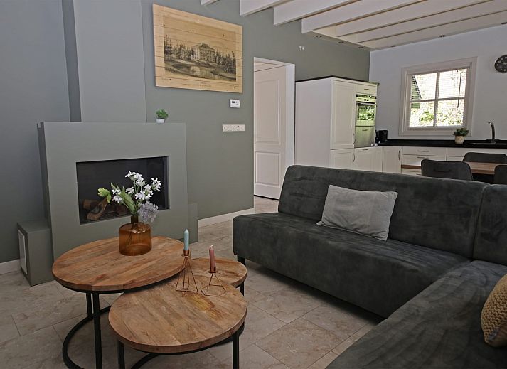 Vakantiewoning Molenbosch in Doorn, Utrechtse Heuvelrug biedt een idyllisch vakantiehuis omgeven door weelderige natuur en rustgevende bossen.