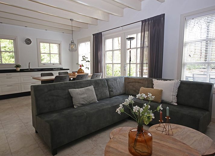 Vakantiewoning Molenbosch in Doorn, Utrechtse Heuvelrug biedt een idyllisch vakantiehuis omgeven door weelderige natuur en rustgevende bossen.