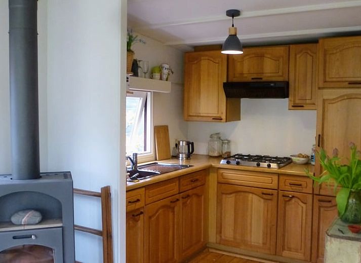 Cozy indoor area of Huisje in Doorn overlooking the nature of the Utrechtse Heuvelrug.