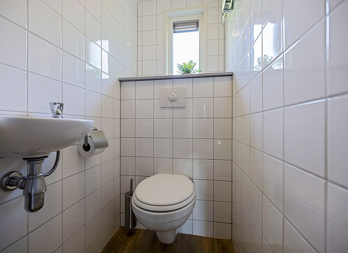 Gemuetliche Veranda im Bungalow Anderstein, Doorn, Utrechtse Heuvelrug, ideal fuer Mahlzeiten im Freien.