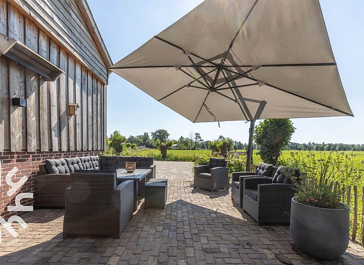 Entspannen Sie sich im luxurioesen Jacuzzi des Ferienhauses UT070 in Doorn, Utrechtse Heuvelrug.