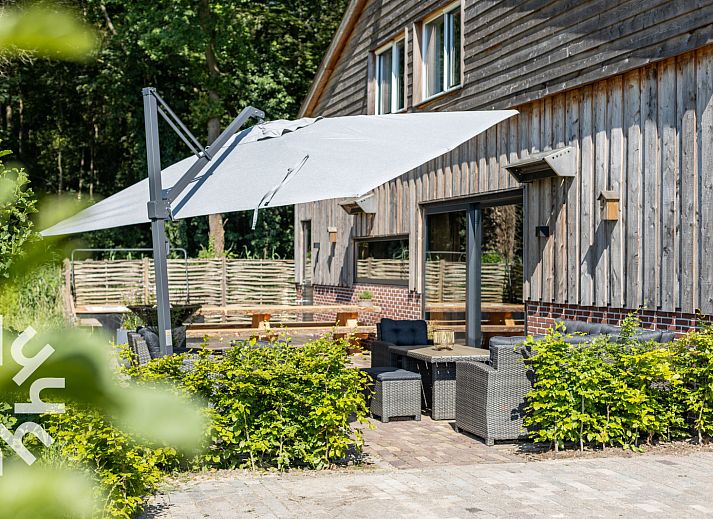 Entspannen Sie sich im luxurioesen Jacuzzi des Ferienhauses UT070 in Doorn, Utrechtse Heuvelrug.