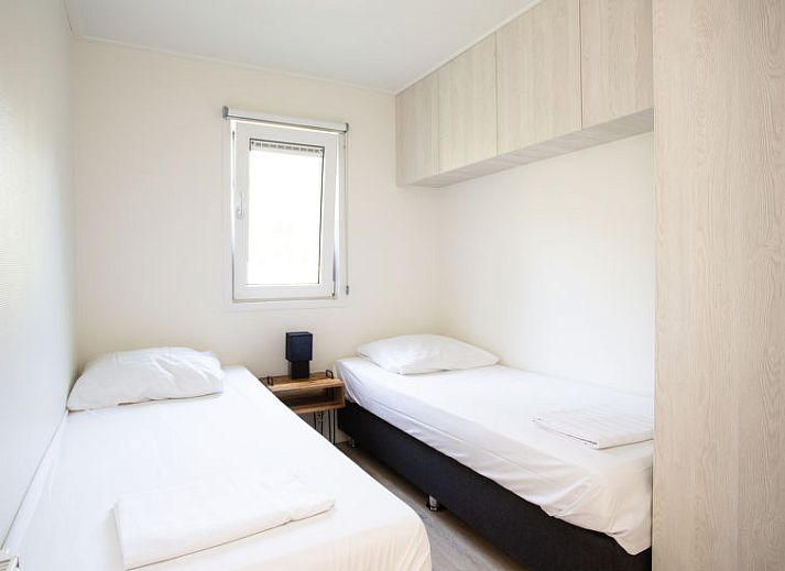 Gezellig terras bij Vakantiehuis De Thijmse Berg in Rhenen, ideaal voor ontspanning in de buitenlucht.